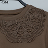 Fashion round neck hollowed out decal solid color top