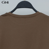 Fashion round neck hollowed out decal solid color top