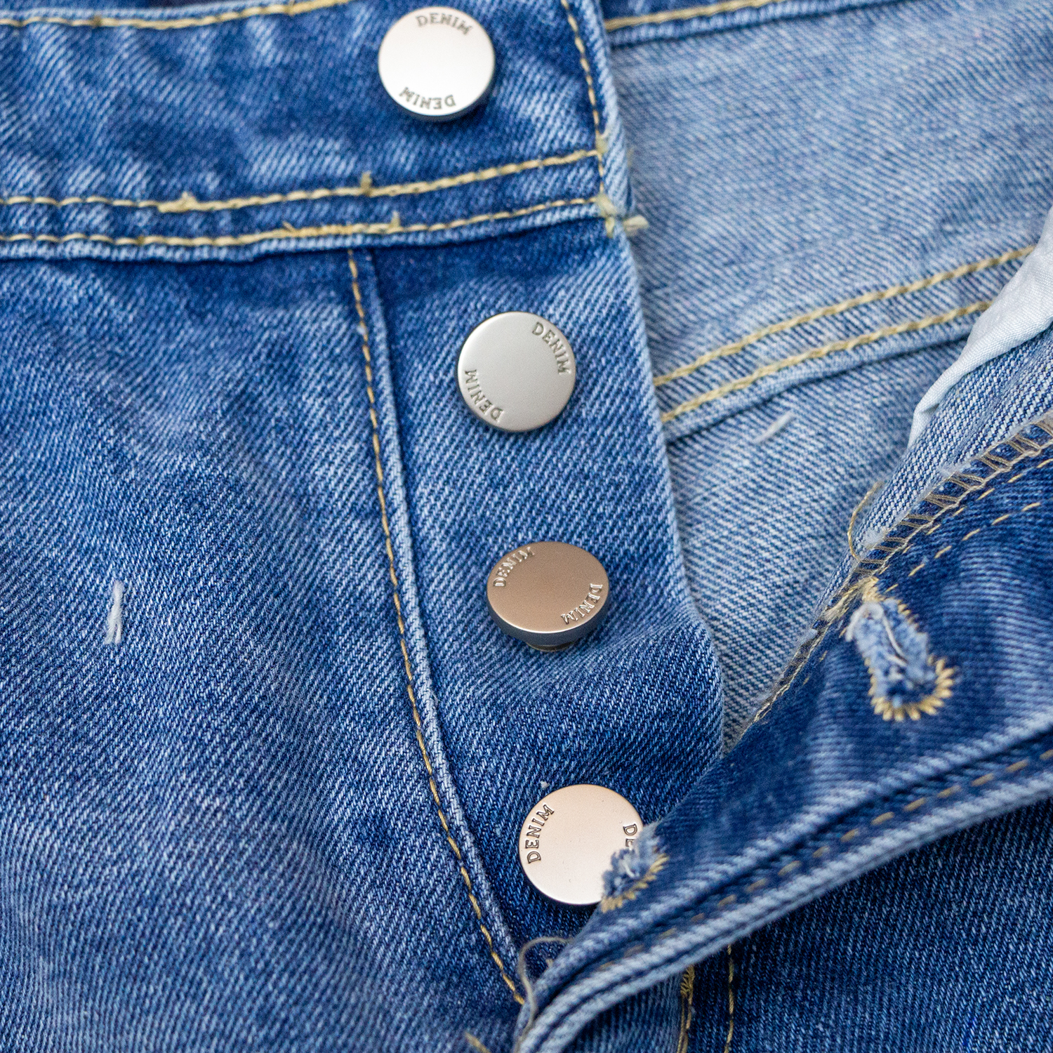 New denim shorts with torn fabric